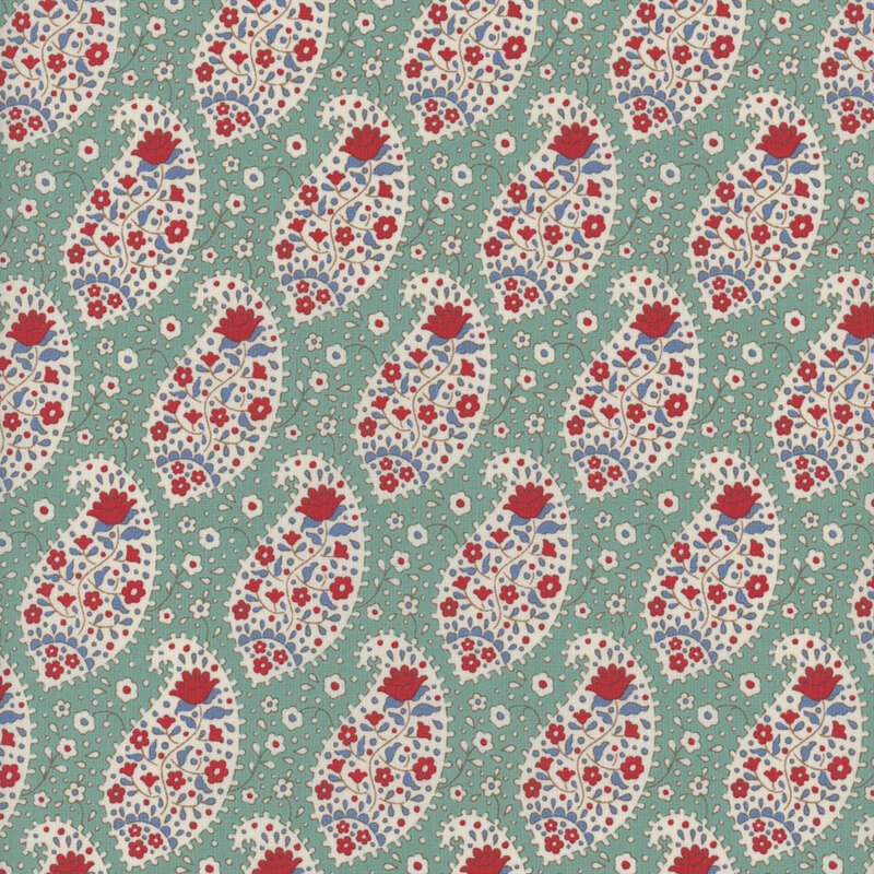This fabric features red and blue florals within white paisley scrolls on a lovely aqua background.