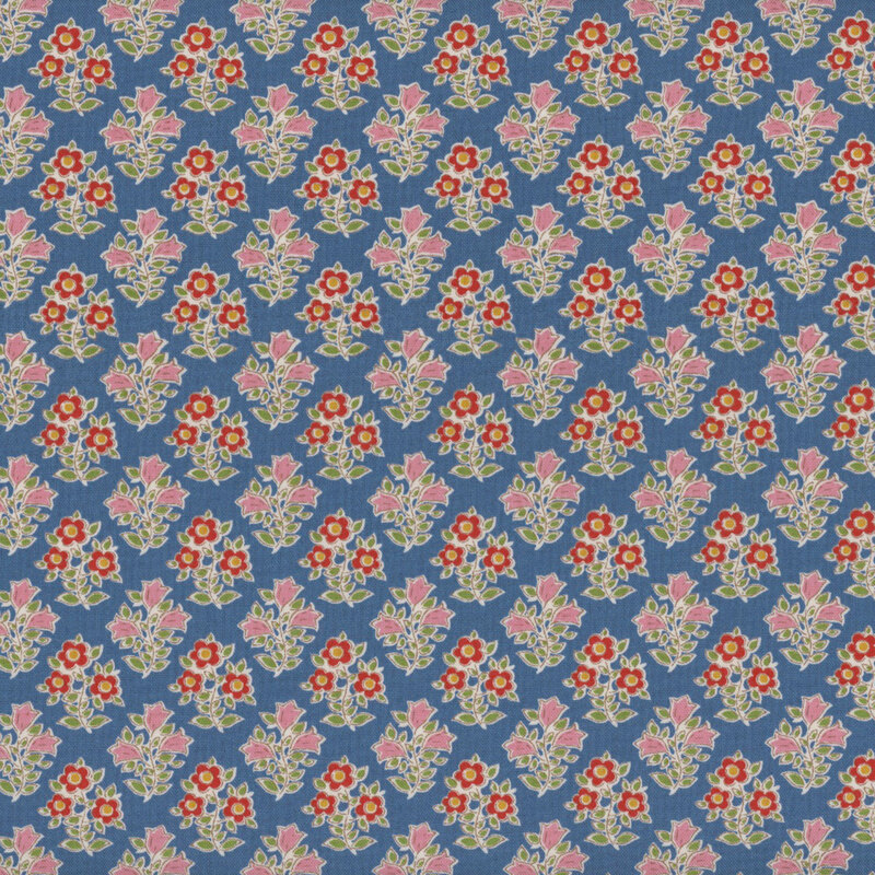 This fabric features a repeating print of red flowers with yellow centers and pink flowers, both with bright green leaves on a dark blue background.