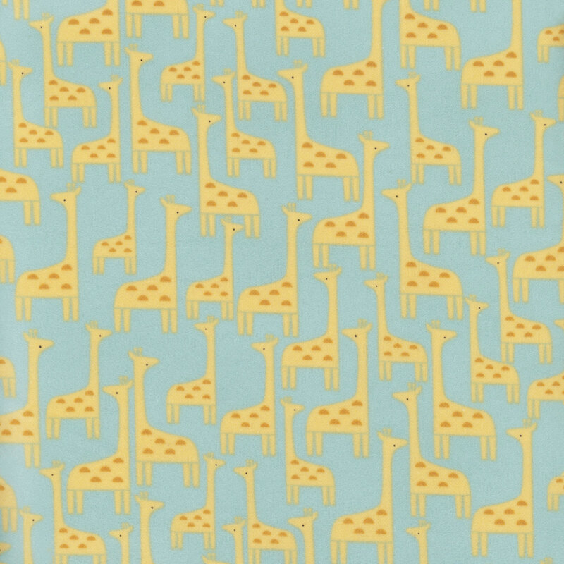 fabric featuring a repeating pattern of adorable giraffes on a dusty aqua background