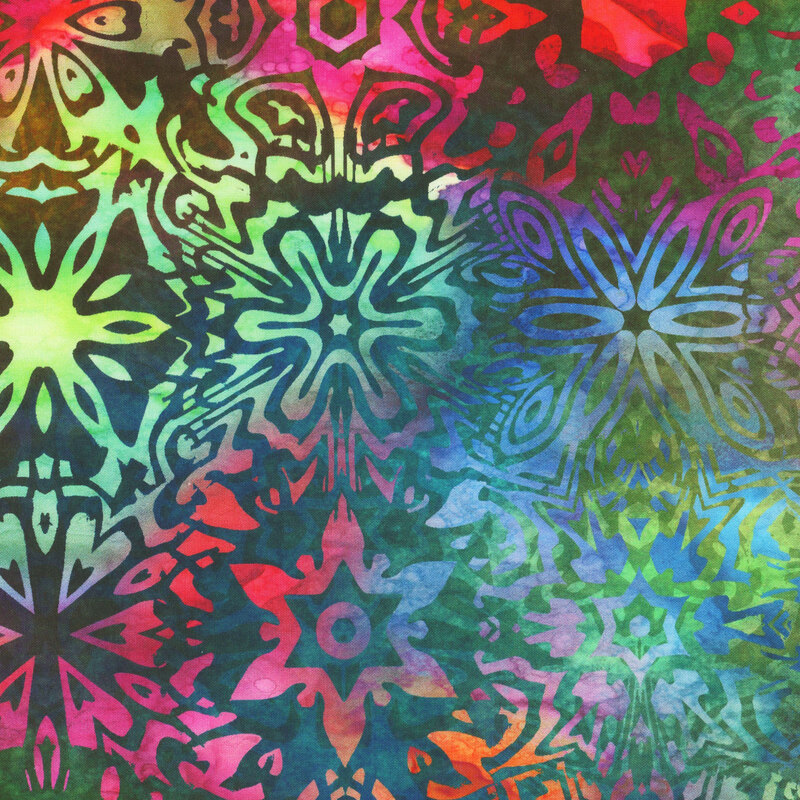 This fabric features a kaleidoscope pattern in a mottled, vibrant rainbow-colored pattern.