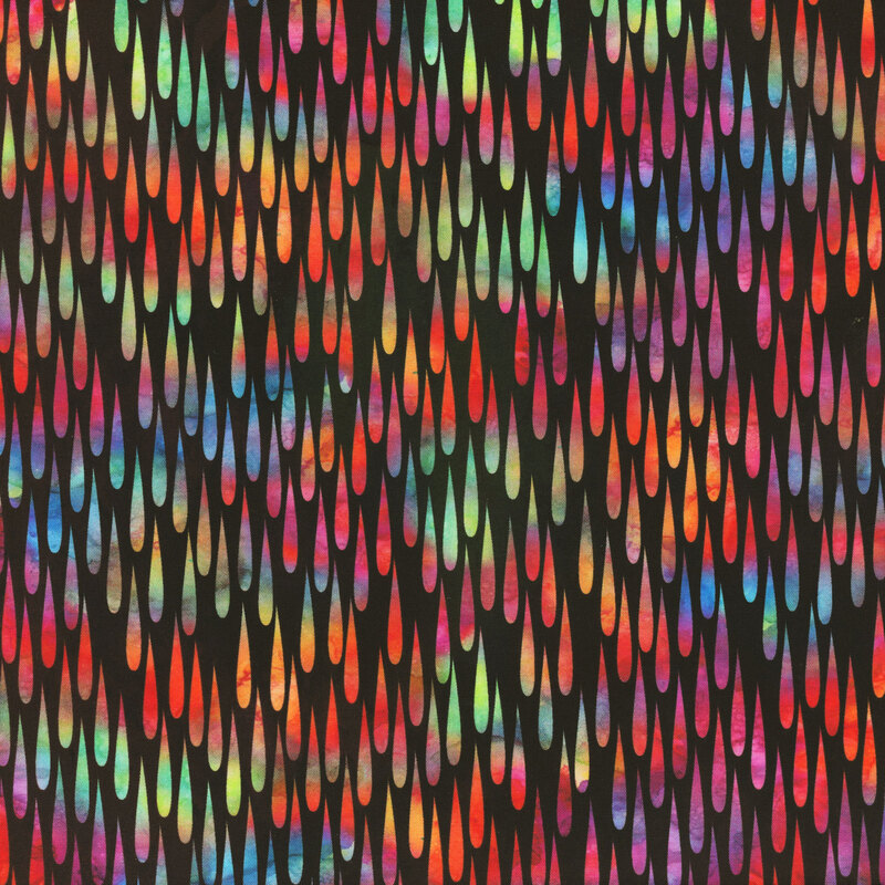This fabric features bright mottled multicolor raindrops on a solid black background.