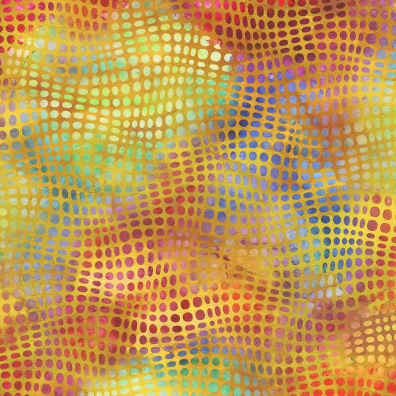 This fabric features multicolored wavy dots on a gold yellow mottled background.