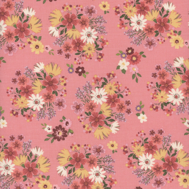 fabric featuring adorable clusters of burnt red, pink, golden yellow and cream flowers with sage green leaves on a solid pastel rose pink background.