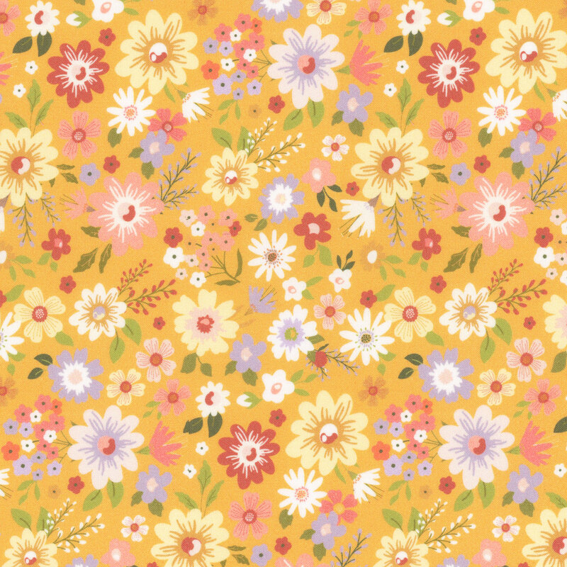 fabric featuring tossed floral print in yellow, pink, dark red and light purple blooms on a warm golden yellow background.