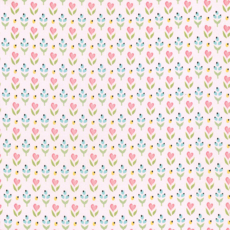 fabric featuring light blue and yellow buds with pink flowers shaped like pink hearts on a off white background.