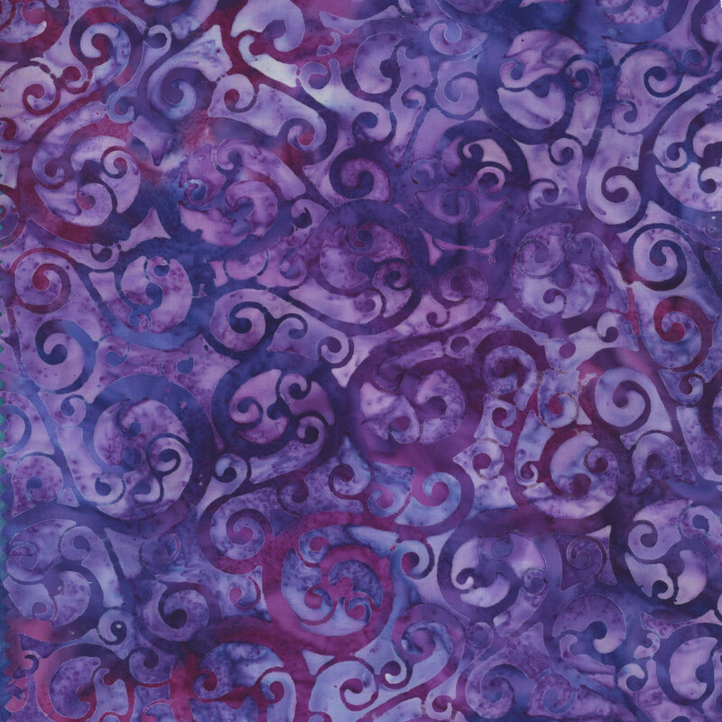 fabric featuring purple and magenta swirls on a lighter purple mottled background.