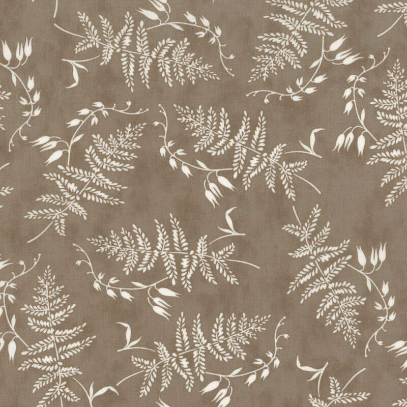 charcoal gray fabric featuring scattered white ferns and foliage