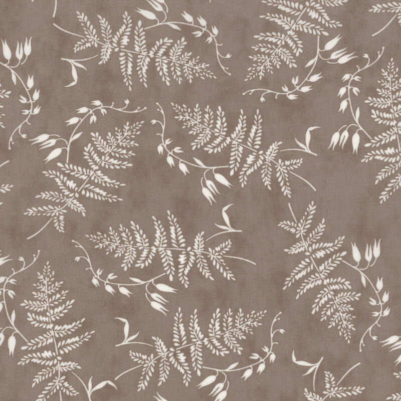 charcoal gray fabric featuring scattered white ferns and foliage