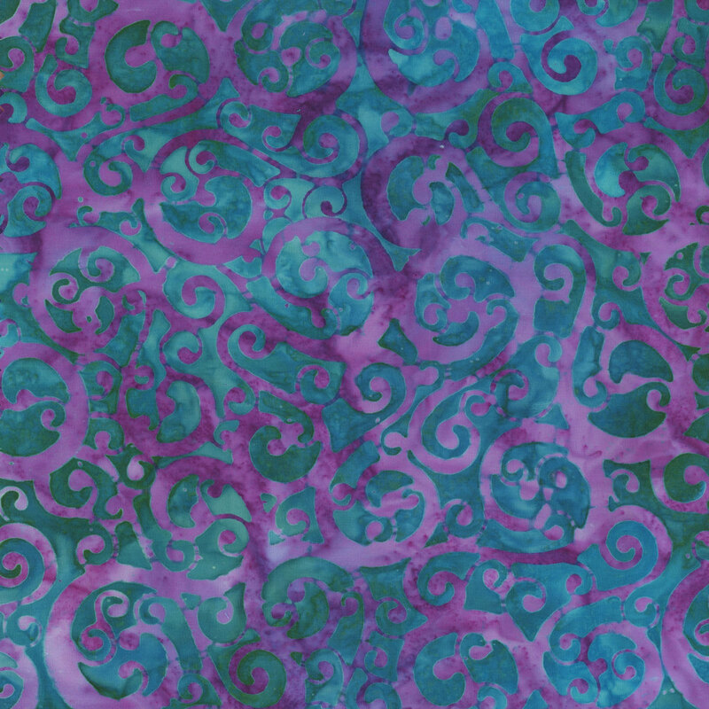 fabric featuring purple swirls on a mottled turquoise background.