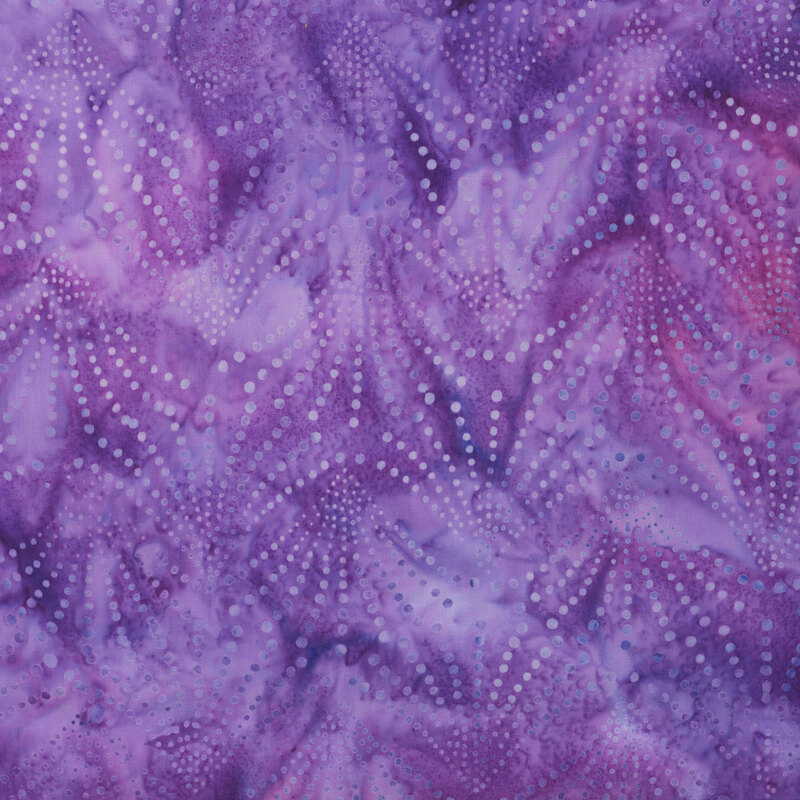 fabric featuring a light dotted fan print on a purple mottled background.