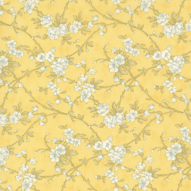 pastel yellow fabric featuring pastel cyan flowers on soft green vines