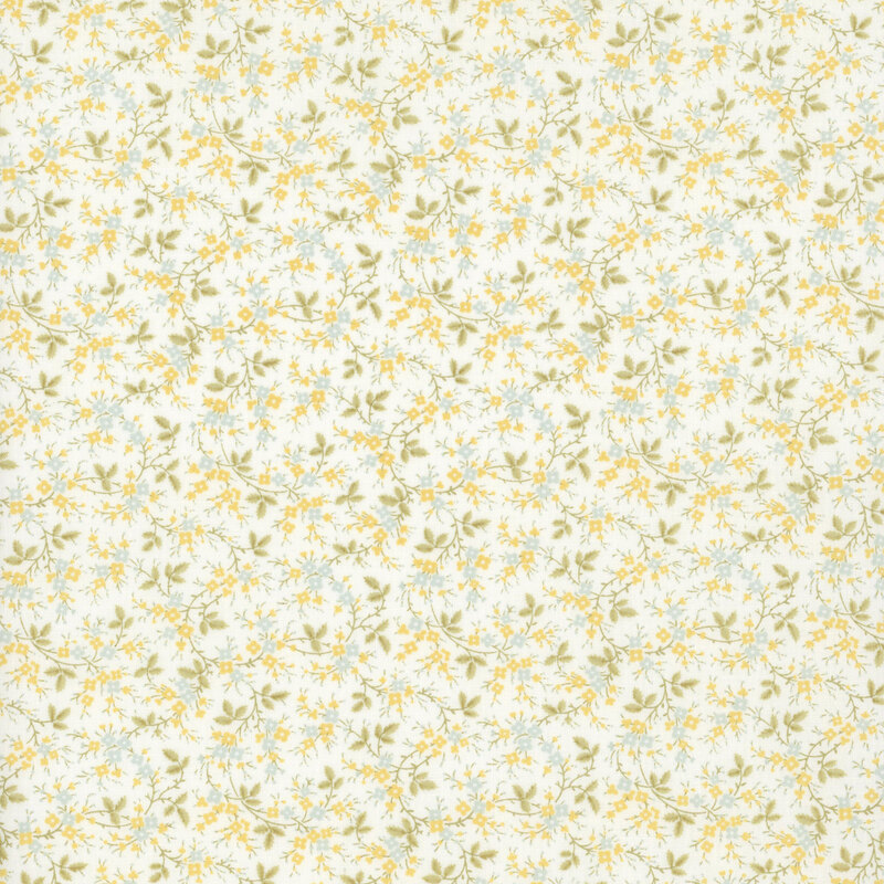 white fabric featuring soft green vines with small pastel yellow and blue flowers
