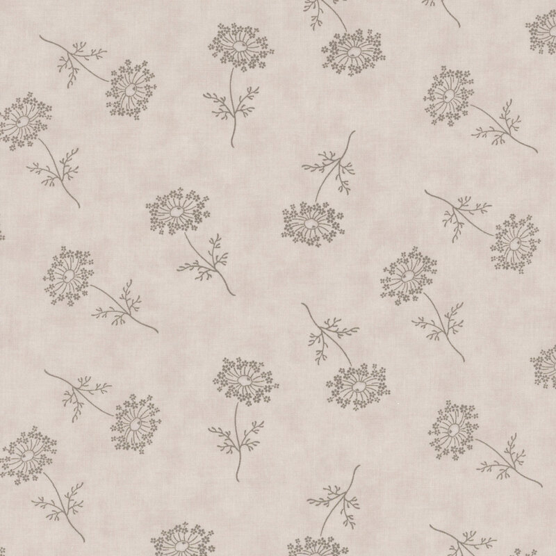mottled gray fabric featuring scattered tonal gray flowers