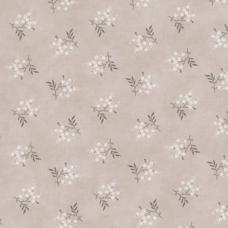 tonal light gray fabric featuring scattered white flowers