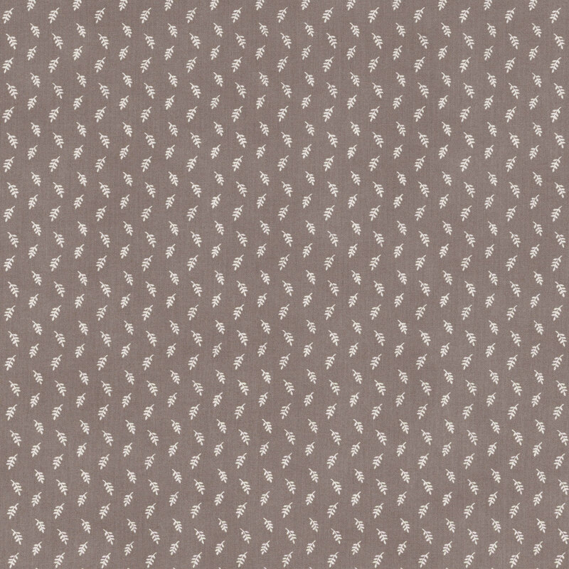 tonal charcoal gray fabric featuring zig-zagging white leaves