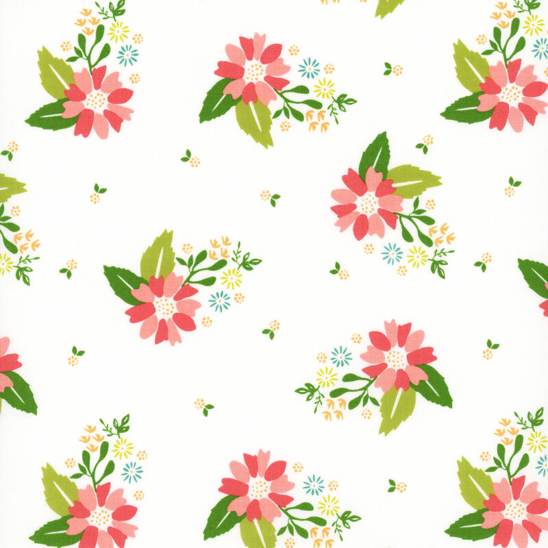 fabric with clusters of pink, yellow and blue flowers tossed on a solid cream white background.