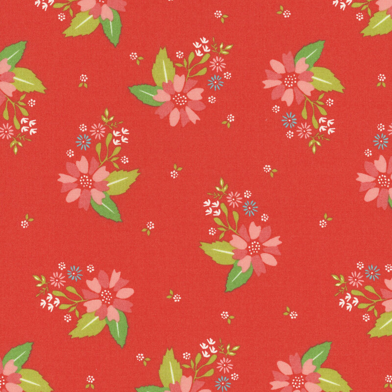fabric featuring clusters of pink and blue flowers tossed on a lovely deep red background.
