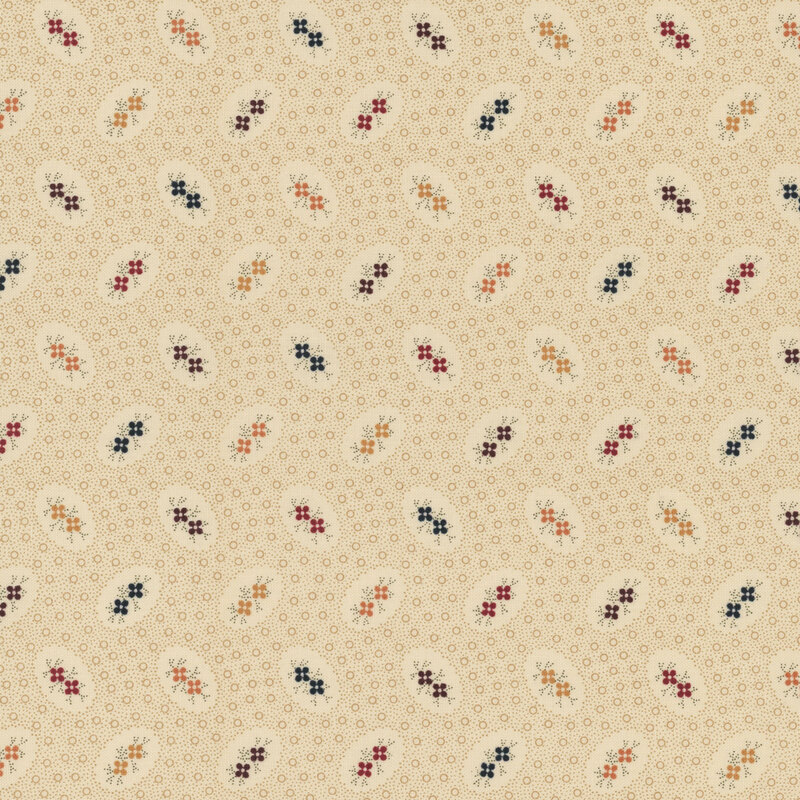 beige fabric featuring deep purple, blue, maroon, orange, and yellow flowers surrounded by dot texturing.