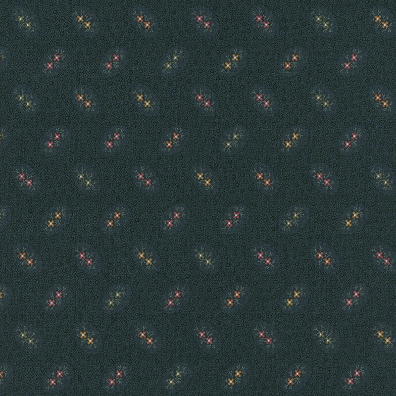 dark blue fabric featuring orange, green, red, maroon, and yellow flowers surrounded by dot texturing