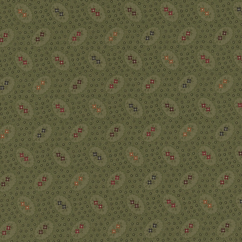 deep green fabric featuring deep purple, blue, maroon, and orange flowers surrounded by dot texturing