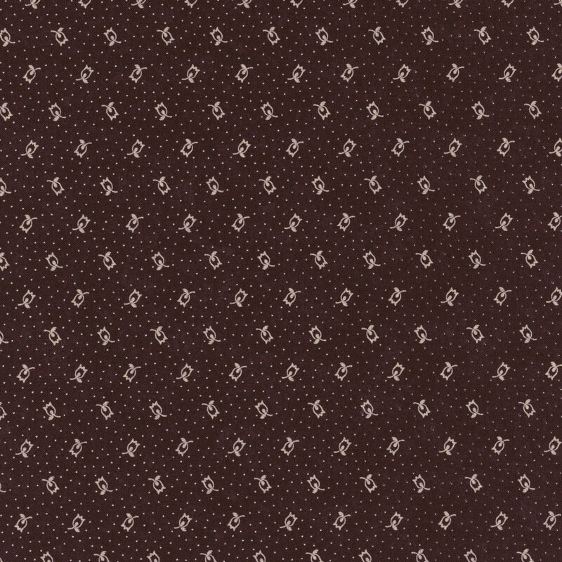 brown fabric featuring scattered tan dots and flowers