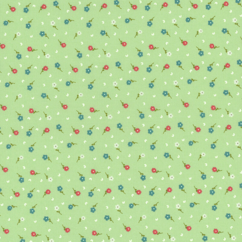 fabric featuring teal, dark pink, and cream ditsy flowers on a solid minty green background.