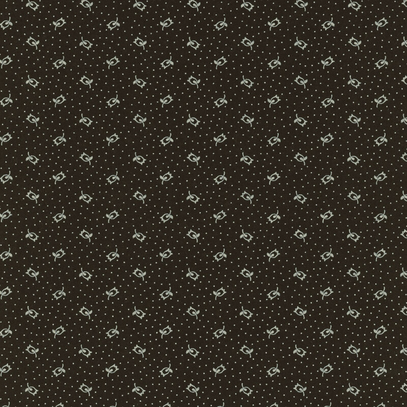 black fabric featuring scattered light gray dots and flowers