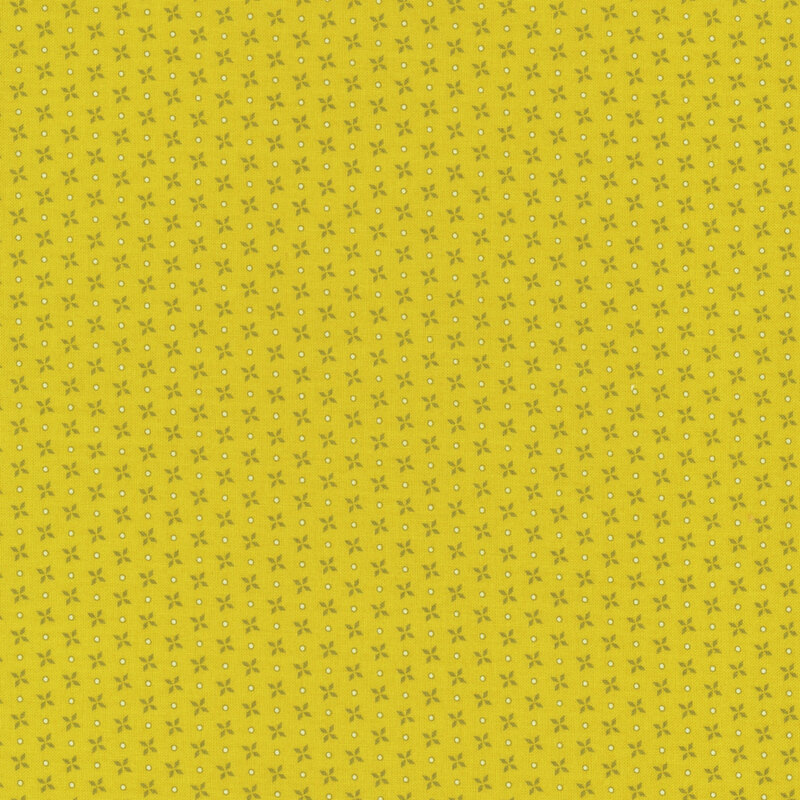 fabric featuring a lovely yellow-green pinwheel print and white dots on a bright yellow background