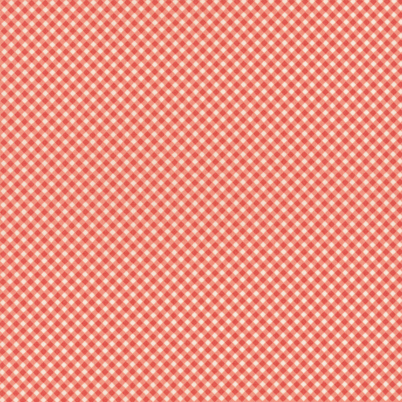 fabric featuring red-pink and white gingham print.