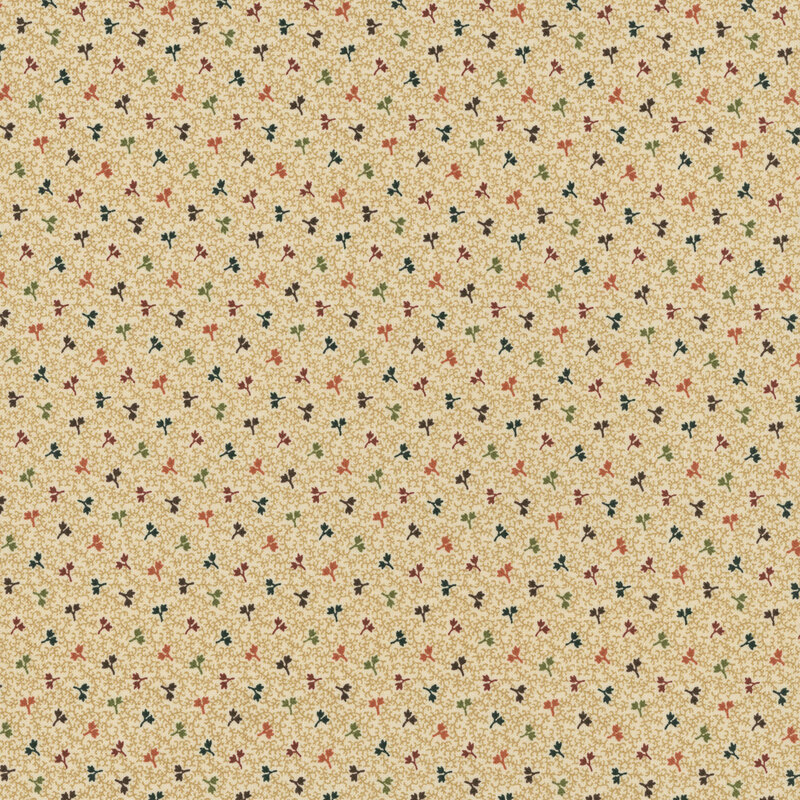beige fabric featuring stylized tonal tan vines with scattered burnt orange, brown, sage green, navy blue, and burgundy leaves
