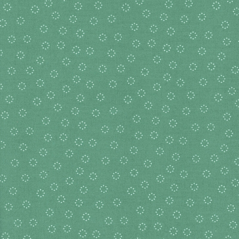 fabric featuring cream white dotted circles tossed on a solid vibrant aqua turquoise background