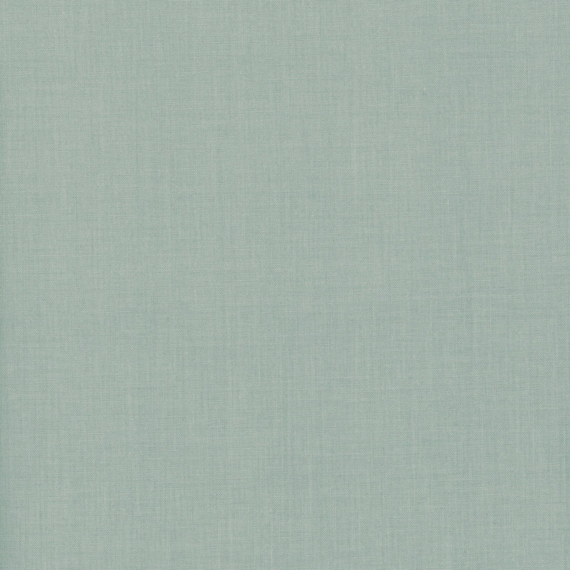  a lovely solid cool faded blue-gray fabric with a woven texture.