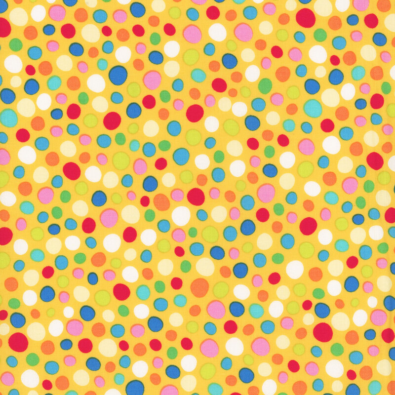 bright yellow fabric featuring scattered brightly colored irregular dots