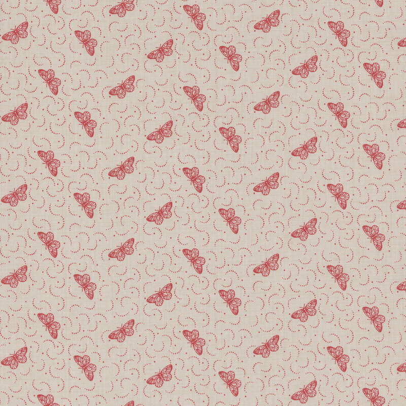 fabric featuring tossed faded red butterflies with dots and dotted crescents on a solid warm gray background