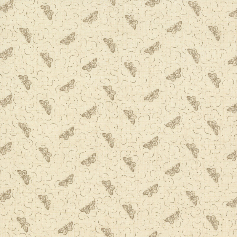 fabric featuring tossed faded warm gray butterflies with dots and dotted crescents on a textured woven cream background.