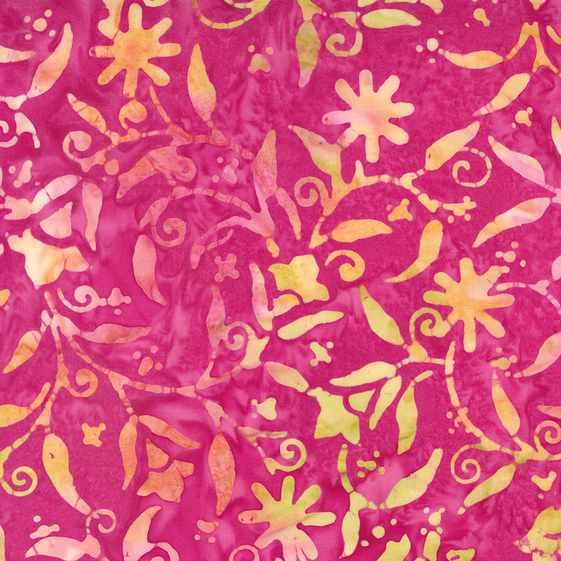 vibrant fuchsia batik fabric featuring a warm sunset floral pattern.