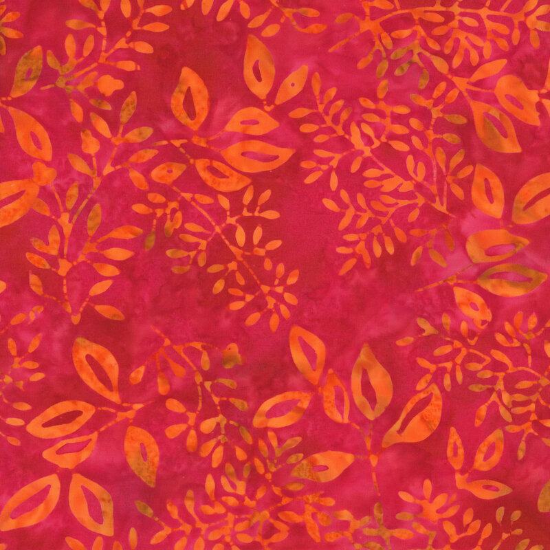 vibrant mottled raspberry fabric featuring scattered orange mottled leaves