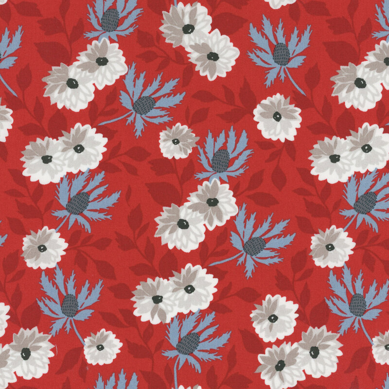 fabric featuring lovely white and blue flowers with darker red leaves on a solid bright red background