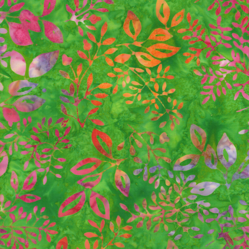 brilliant kelly green mottled fabric featuring scattered leaves in irregularly shifting purple, orange, and magenta
