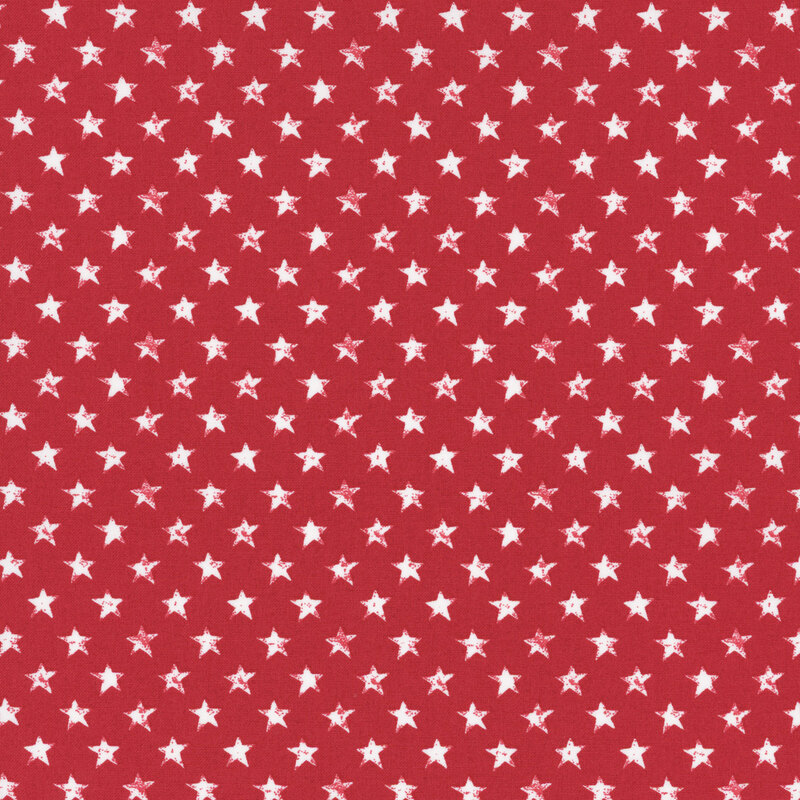 fabric featuring grunge white stars on a solid red background.