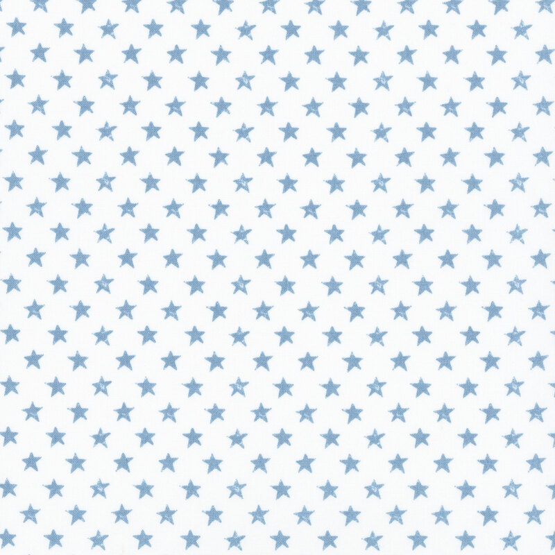 fabric featuring grunge blue stars on a solid white background.