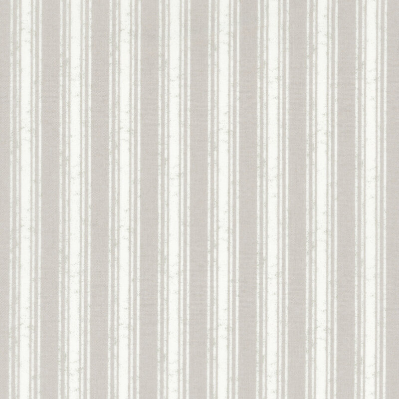 fabric featuring bold white stripes on a solid gray background