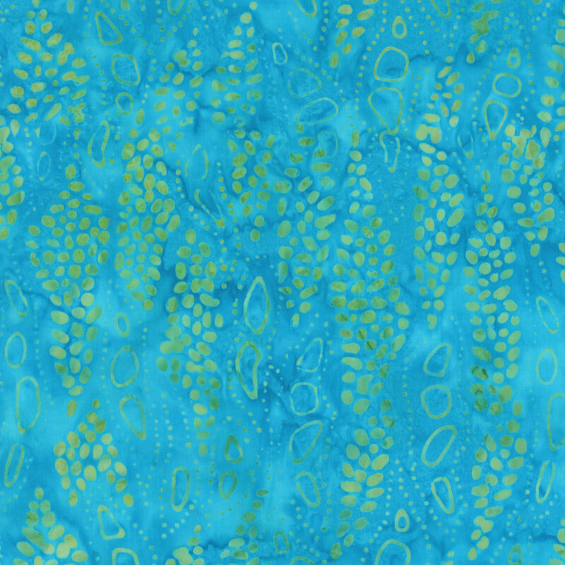 vibrant blue mottled fabric featuring an amorphous sea green and teal dot pattern