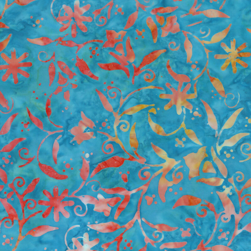 vibrant teal batik fabric featuring a mottled orange and yellow floral swirling pattern