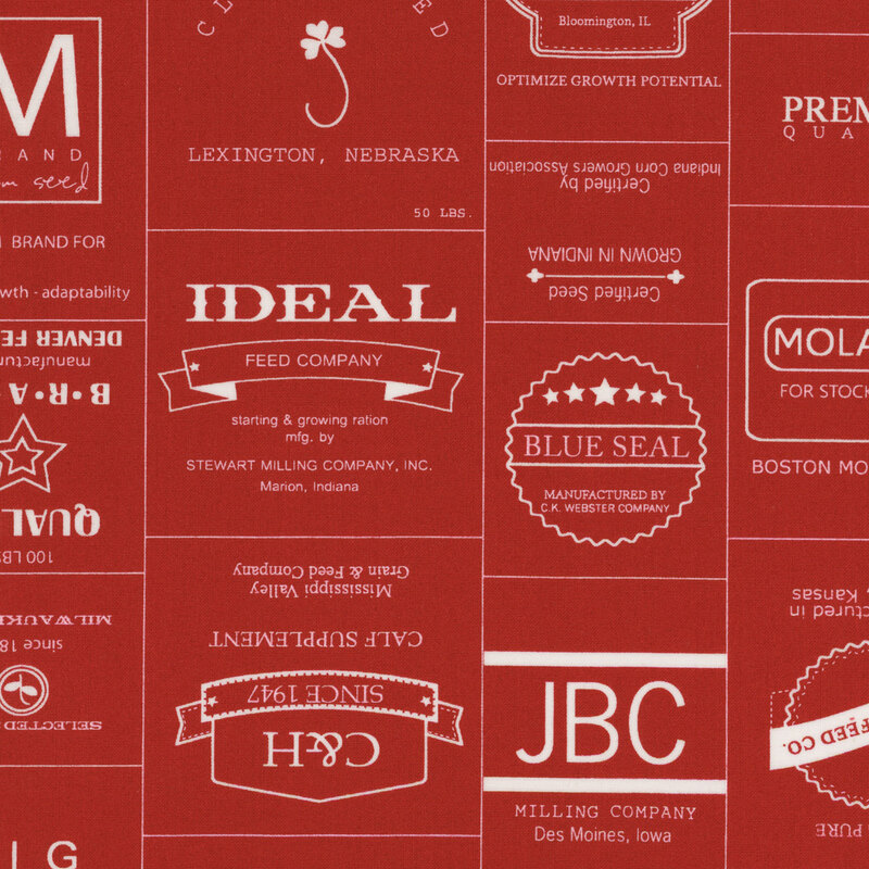 red fabric featuring various white farming brands in a tiled pattern
