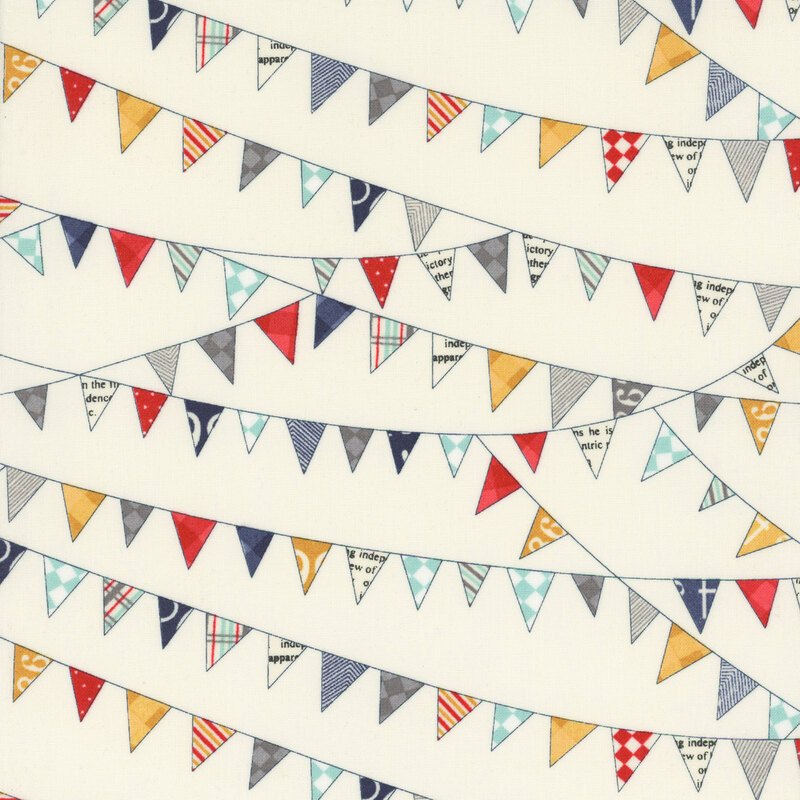 cream fabric featuring festive triangle bunting in navy blue, mustard yellow, red, aqua, gray, and white