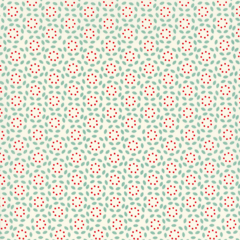 cream fabric featuring a repeating aqua petal pattern surrounding a red circle of dots