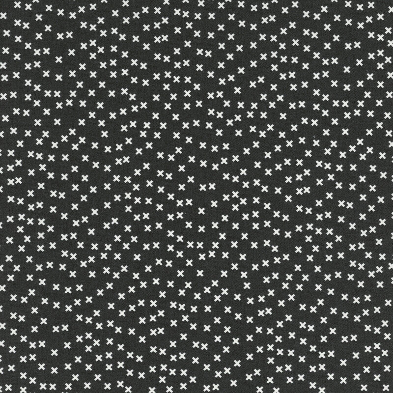 dark navy fabric featuring a scattered white x pattern