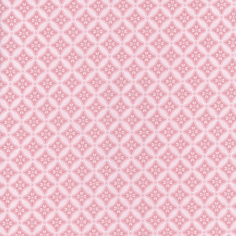 Pink tonal fabric in a geometric, mosaic-like pattern