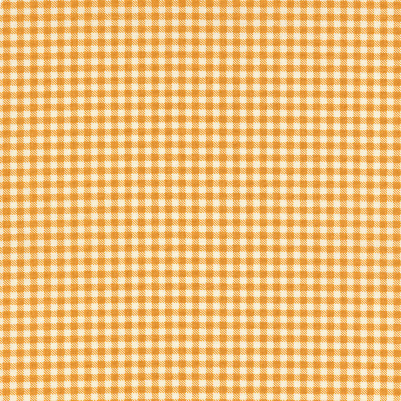 mustard yellow gingham fabric featuring diagonally dashed connecting squares